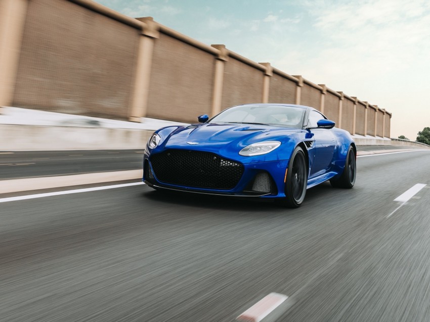 Aston Martin Dbs Aston Martin Sportscar Blue Front View Road Speed Background