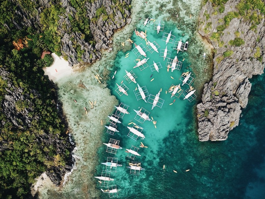 Bay Aerial View Boats Shore Rocks Background