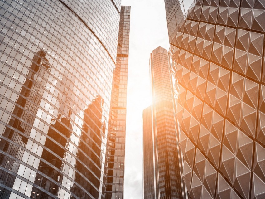 modern skyscrapers, urban architecture, glass buildings, city skyline, sunlight reflection