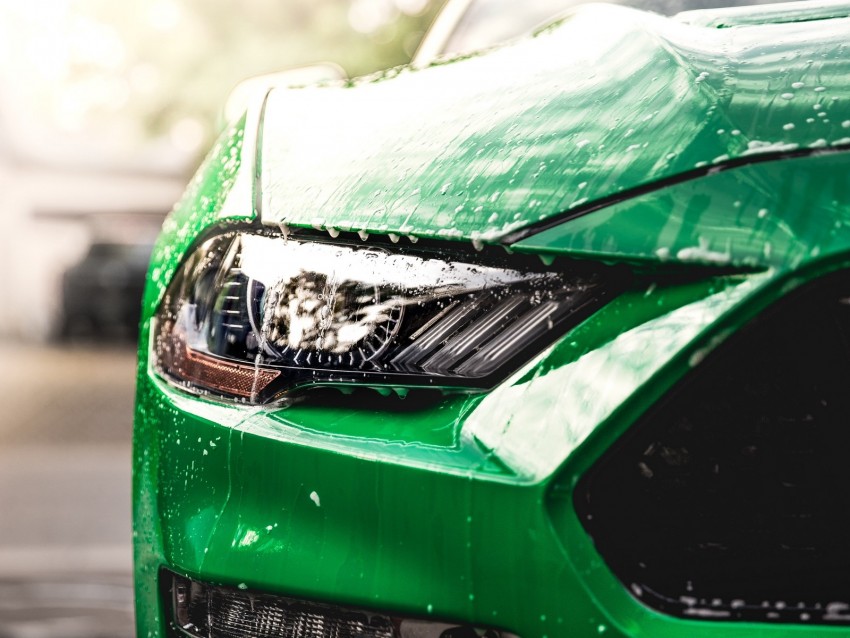 Car Green Wet Headlight Front View Background