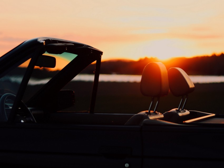 convertible car, sunset scenery, open-top vehicle, leisure drive, evening landscape