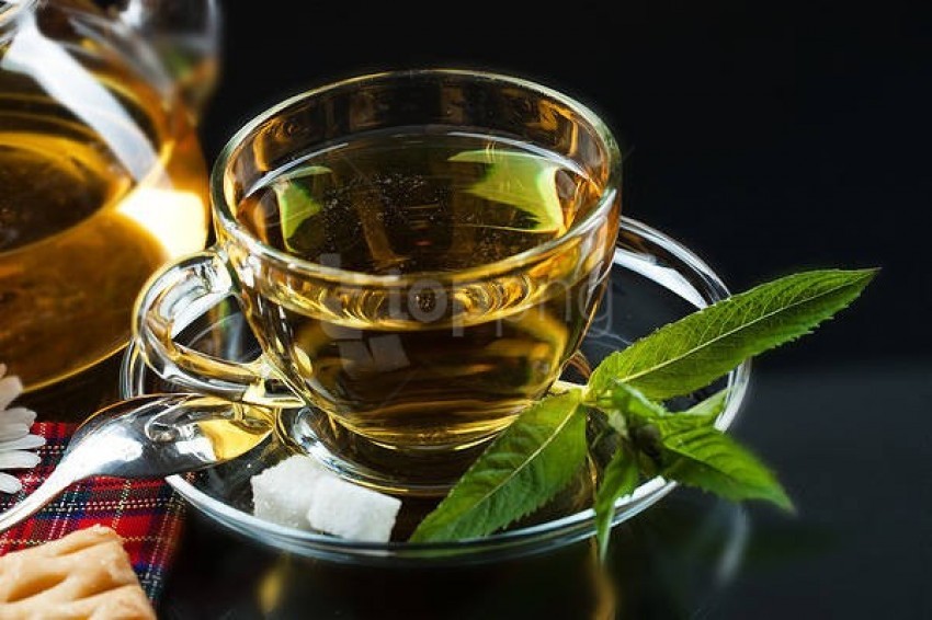 herbal tea, mint leaves, sugar cubes, glass cup, snack platter, refreshing beverage, green tea