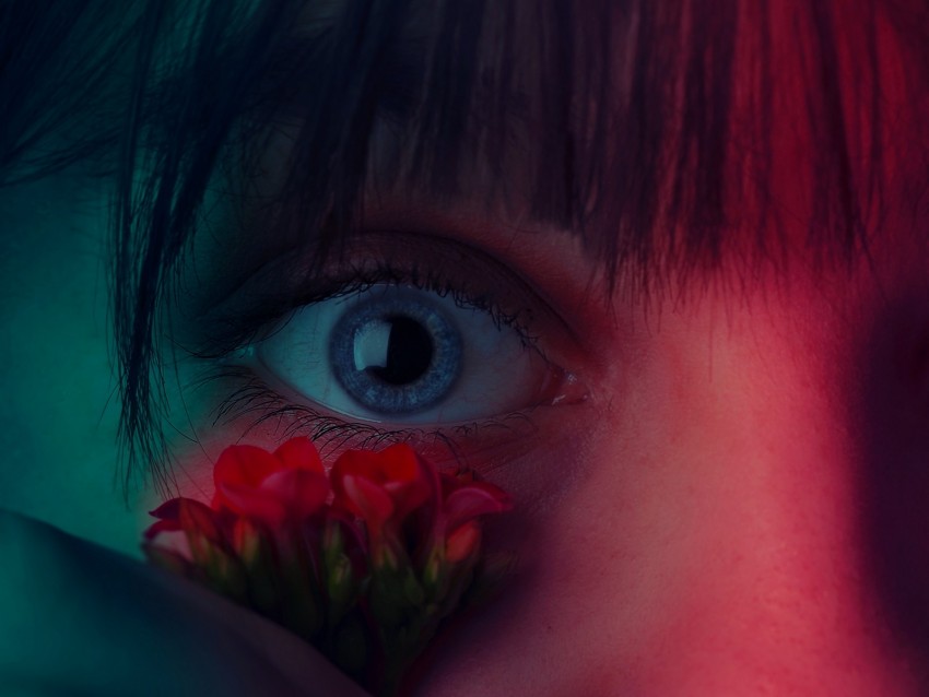 blue eye, floral close-up, artistic portrait, vibrant colors, emotional expression