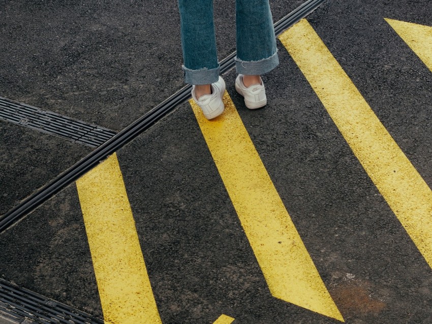 Legs Marking Yellow Asphalt Background