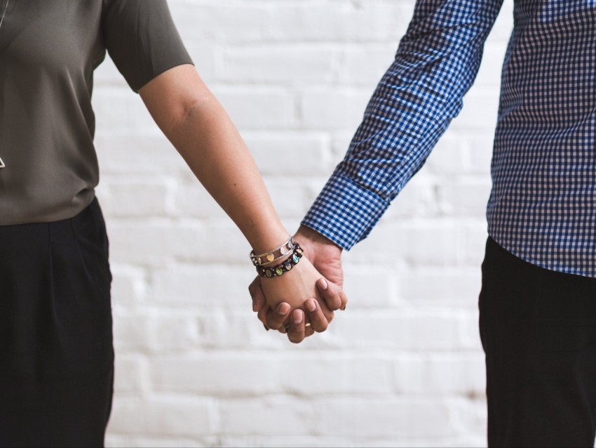 Pair Hands Touch Tenderness Bracelets Background