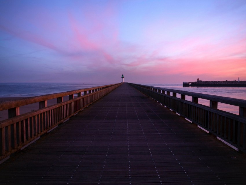 pier at sunset, serene seascape, wooden walkway, coastal sunset, lighthouse view