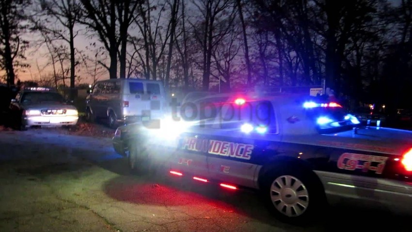 emergency lights, public safety, police vehicle, nighttime scene, law enforcement, dark surroundings, illuminated