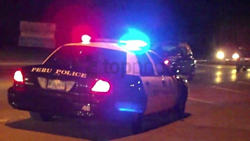 police car, emergency vehicle, blue lights, night scene, law enforcement, Peru police, traffic stop