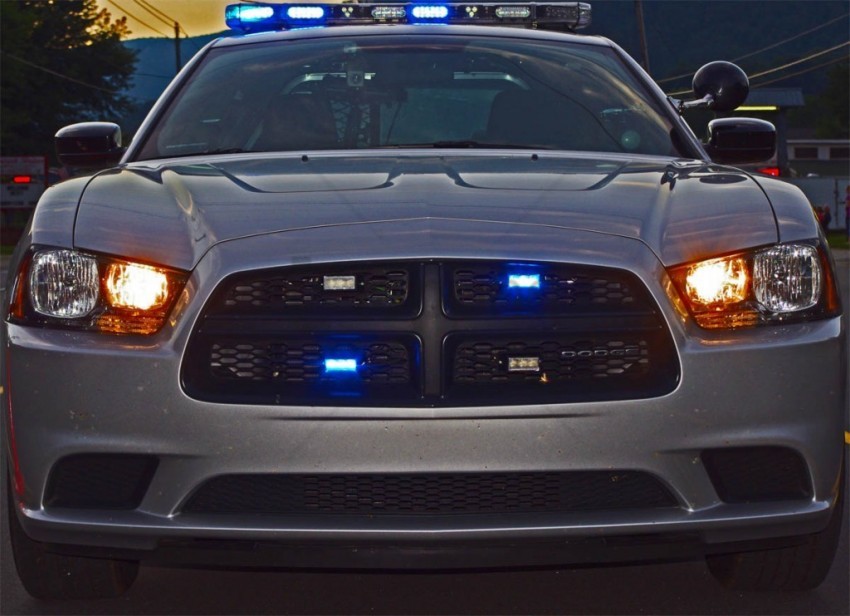 police car, emergency vehicle, blue lights, sedan, law enforcement, automotive design, front grille