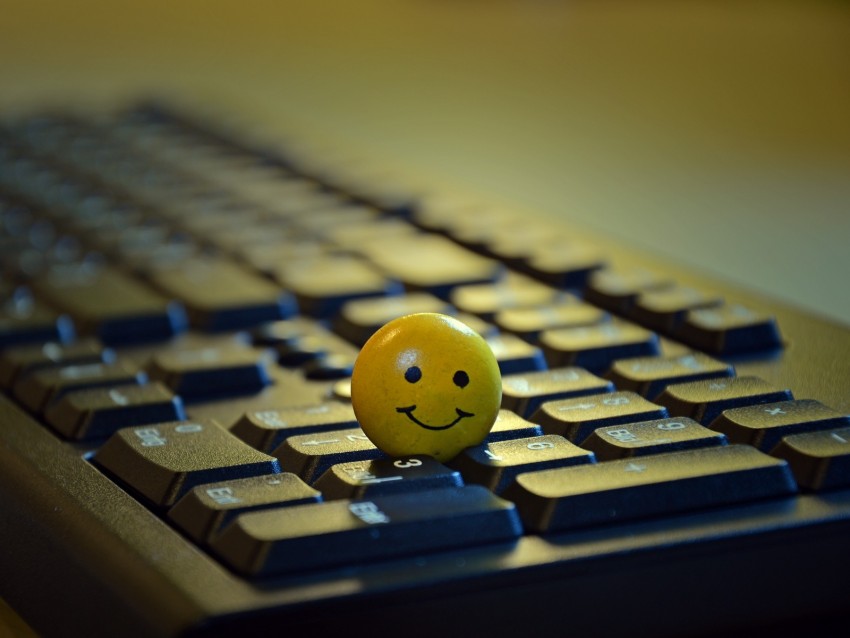 smiley face, keyboard, computer accessory, office decor, cheerful decoration