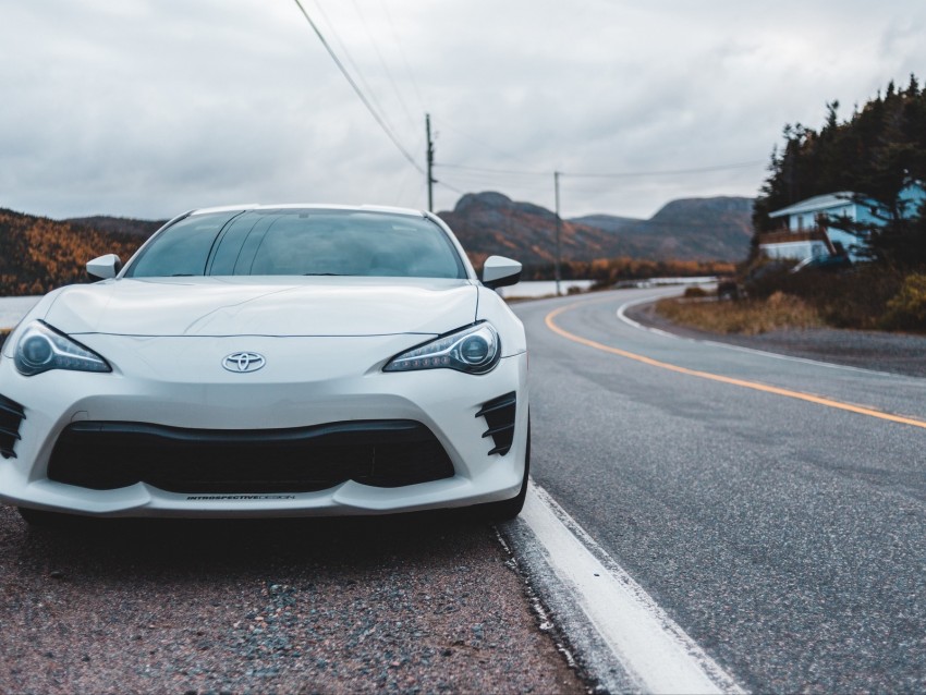 Toyota car, scenic road, white sports car, automotive photography, nature background